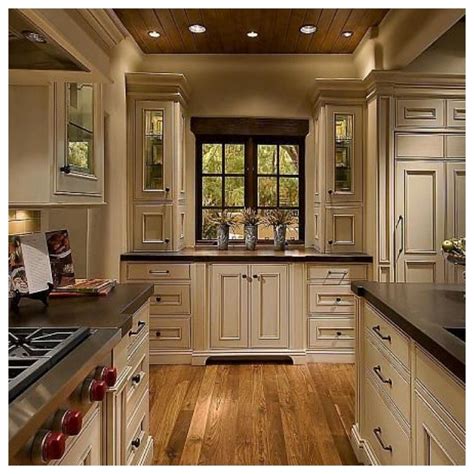 Cream kitchen cabinets warm colors for a cozy atmosphere deavita. Cabinet, Cream Colored Kitchen Cabinets Feat Black ...