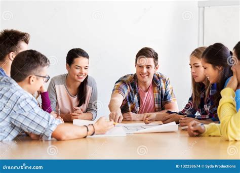 Group Of Smiling Students Meeting At School Stock Photo Image Of Plan