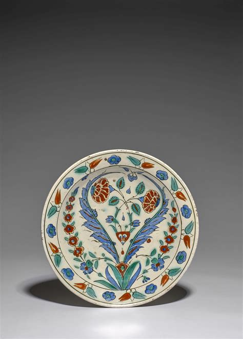 An Iznik Pottery Dish Painted With Double Saz Palms And Flowers Turkey