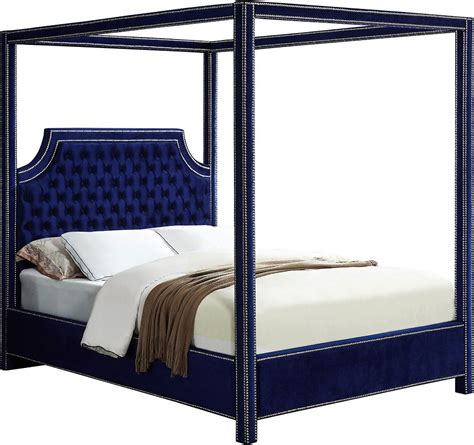 The gray padded headboard is enhanced with stylish button tufting to provide excellent back support in modern fashion. Rowan Upholstered Platform Canopy Bed (Navy) Meridian ...
