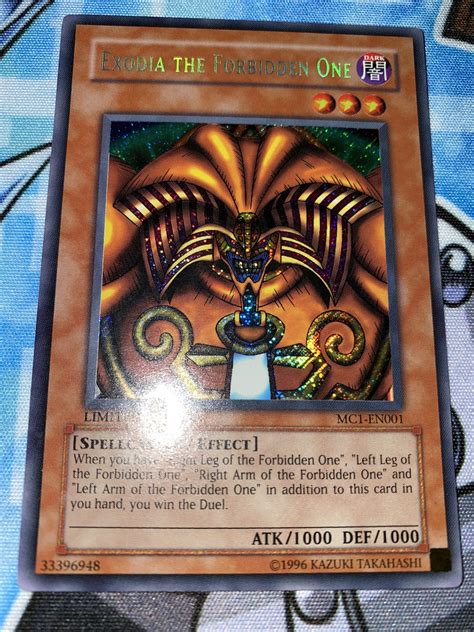 An automatic victory can be declared by the player whose hand contains this card together with the left leg / right leg / left arm / right arm of the forbidden one. Exodia The Forbidden One MC1 | Clerc's Trading Cards