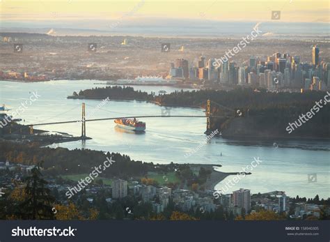 A High Angle View Of Downtown Vancouver The Lions Gate Bridge And