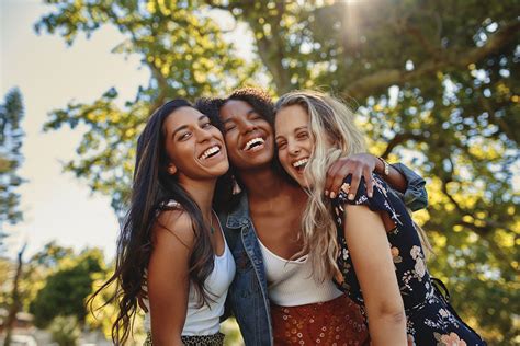 Portrait Of A Happy Multiethnic Group Of Smiling Female Friends Women Laughing And Having Fun