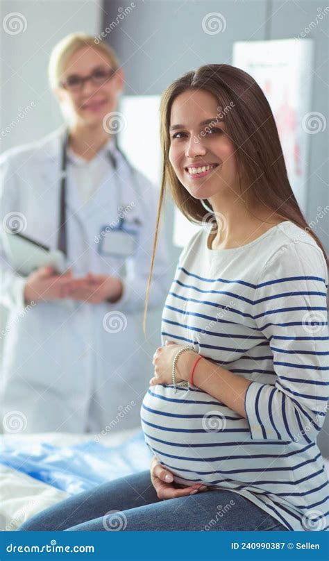 Beautiful Smiling Pregnant Woman With The Doctor At Hospital Stock Image Image Of Heartbeat