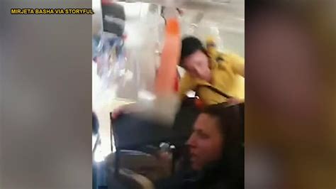 video shows flight attendant hitting plane ceiling passenger praying during severe turbulence