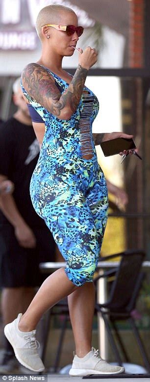 amber rose rocks backless outfit in hollywood daily mail online