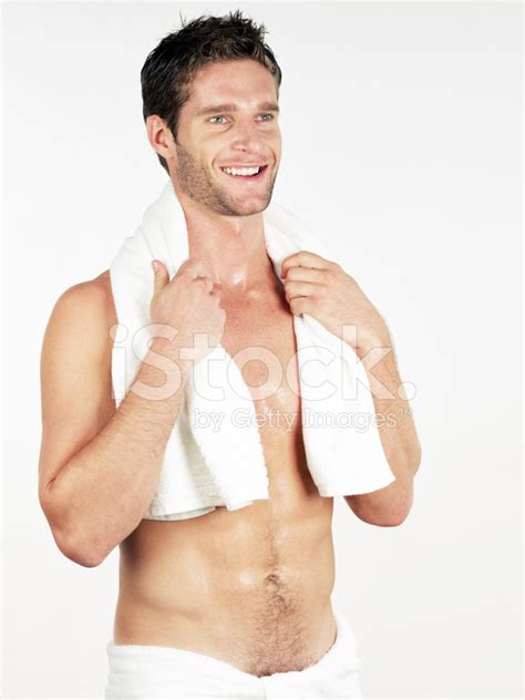 Man Wrapped In Bath Towel Smiling Stock Photo Royalty Free Freeimages