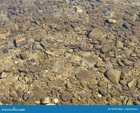 Crystal Clear Water Stock Photo Image Of Pebbles Stones 129731862