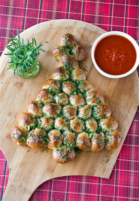 This pull apart christmas tree is a festive appetizer to serve for a holiday party! Christmas Tree Pull-Apart Bread - (Free Recipe below) | Christmas tree food, Food recipes ...