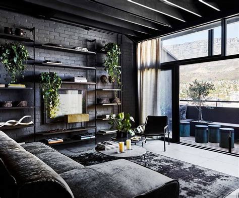 An Industrial Style Apartment With A Dark And Moody Monochrome Palette