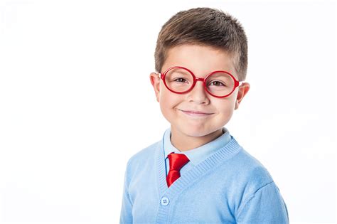 A young boy dressed nicely and wearing red glasses | Florida child ...