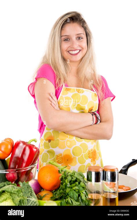 Beautiful Woman Cooking In The Kitchen Stock Photo Alamy