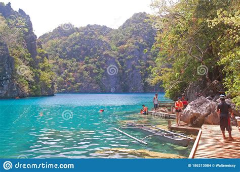 Tourists Swimming At Kayangan Lake In Coron Palawan Philippines
