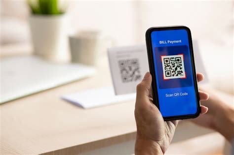 Premium Photo Hand Using A Smartphone To Scan A Qr Code