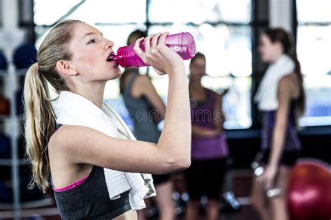 Blonde Woman Drinking Water After Working Out Stock Photo Image Of