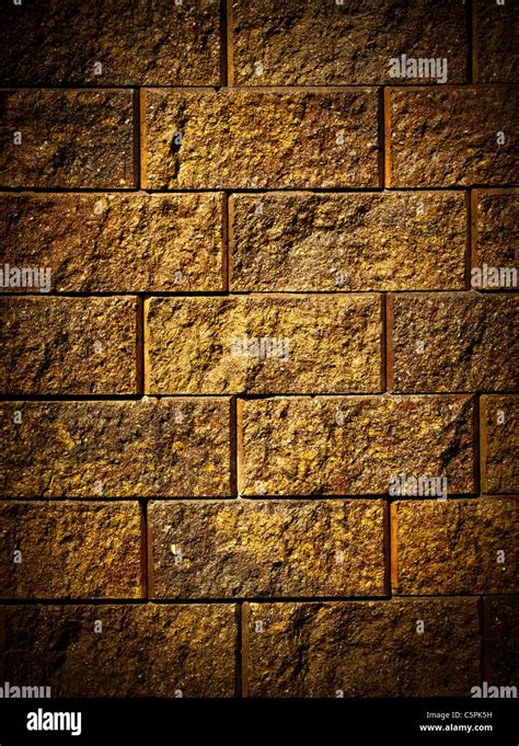 Dark Gold Brick Wall Background Or Texture Stock Photo Alamy