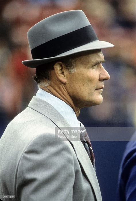 Head Coach Tom Landry Of The Dallas Cowboys Watches The Action From The