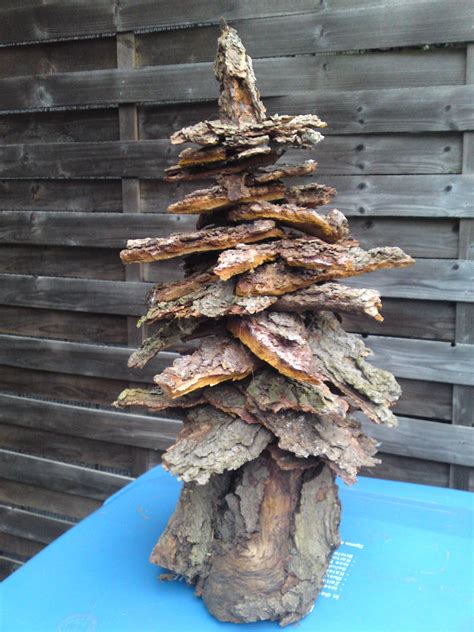 A Tree Made From Bark Of A Tree Tree Bark Crafts Tree Bark Craft Images