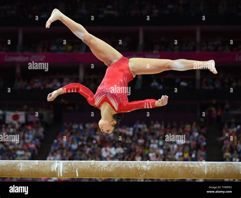Usas Alexandra Raisman Flips On The Balance Beam During Her Routine At The Womens Gymnastics