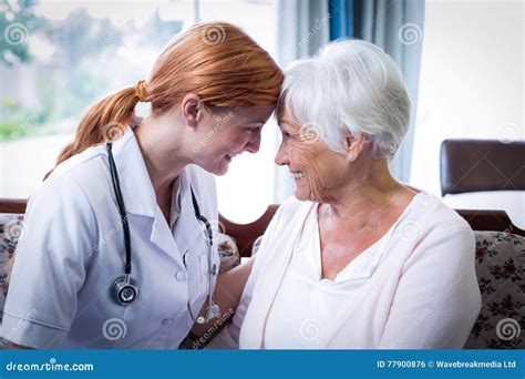 Smiling Doctor And Patient Looking Face To Face Stock Photo Image Of