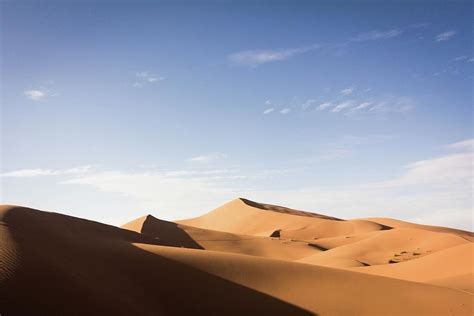 Brown Sand Under Blue Sky During Daytime Sahara Desert Photograph By