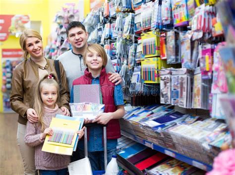 Parents With Children Buying Writing Materials Stock Photo Image Of