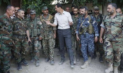 Assad Breaks Bread With Syrian Soldiers During Ramadan