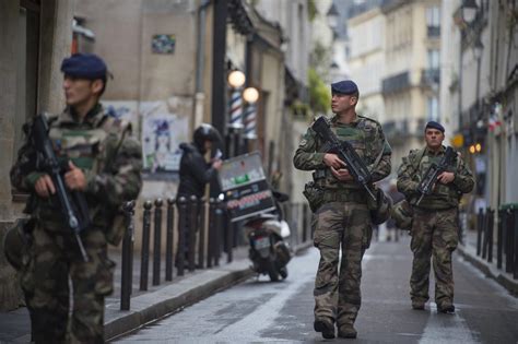 French Soldiers Patrolling In The Streets Of Paris Opération