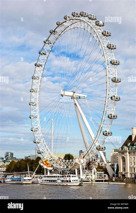 The Giant Ferris Wheel London Eye In Front Of The Thames River London