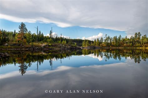 Clouds And Sky Over Calm Lake Boundary Waters Canoe Area Wilderness