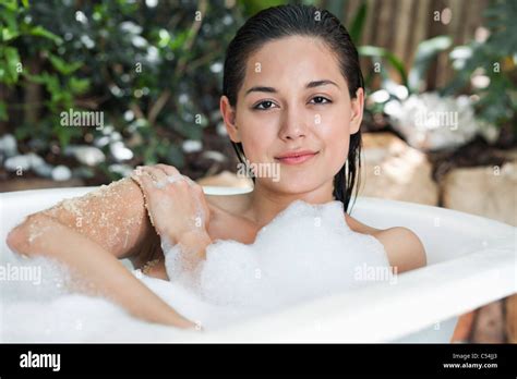 Portrait Of A Beautiful Young Woman Taking Bubble Bath Stock Photo Alamy