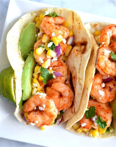 Loaded with roasted corn, lime, chili powder and mexican crema! Chili Lime Shrimp Tacos with Mexican Street Corn Salsa ...