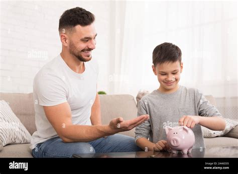 Father Giving Money Son Hi Res Stock Photography And Images Alamy