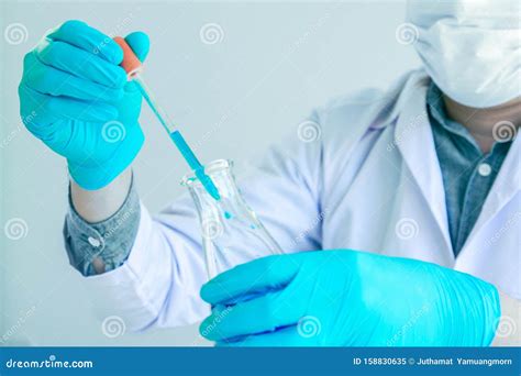 Medical Science Or Male In Laboratory Room Researcher Performs Tests Of