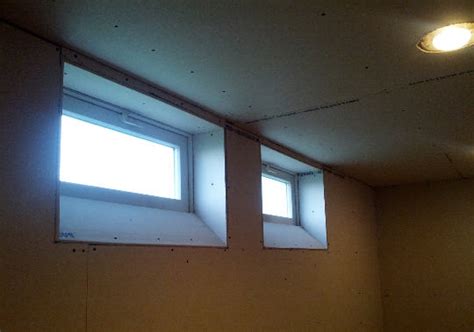 Creating decorative black frame my friend shauna trimmed her window in simple shaker style trim. Great Basement Idea - Angled Basement Windows