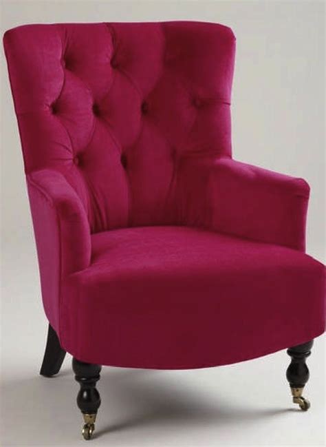 The fuchsia dining chair is more than just a comfortable place for guests to sit during your next gathering. Fuschia chair | Furniture, Living room chairs, Pink armchair
