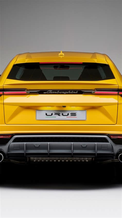 Download 1080x1920 Wallpaper Lamborghini Urus Yellow Car Rear
