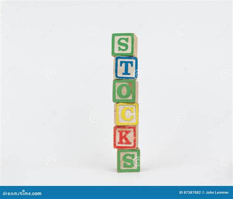 The Word Stocks In Wooden Childrens Blocks Stock Photo Image Of