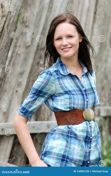 Young Country Woman With Wooden Fence Stock Photo Image 14982128