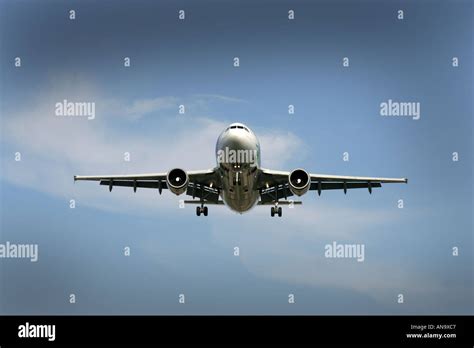 Commercial Airliners Coming Into Land At Heathrow Airport Stock Photo