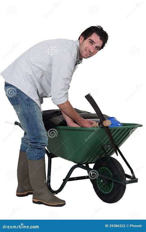 Man With A Wheelbarrow Stock Photo Image Of Pickax Labour 29386322