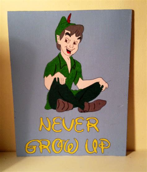 A Card With The Words Never Grow Up And A Cartoon Image Of Peter Panton