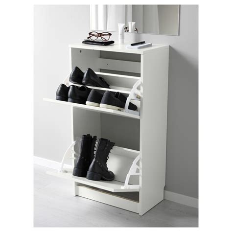 This shoe cabinet is both bad design and bad, cheap manufacturing. BISSA Shoe cabinet with 2 compartments, white, 49x93 cm - IKEA