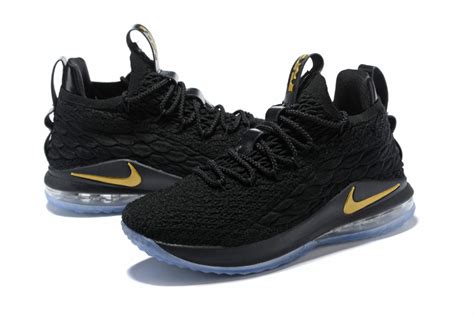 Lebron's 15th signature shoe is constructed with a black battleknit upper that wraps the entire foot with a seamless and snug fit. Nike LeBron 15 Low Black/Metallic Gold Men's Basketball Shoes