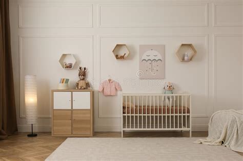 Modern Baby Room Interior With Stylish Furniture And Toys Stock Image
