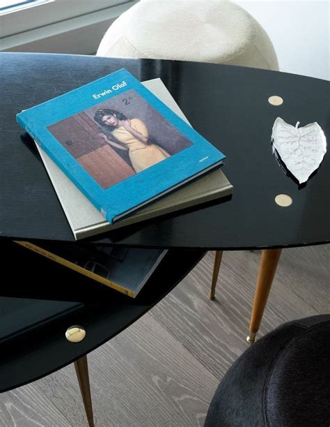 Coffee table books add a gorgeous design element to a table or shelf, and they're a gift that your housewarming host will have forever. Flip Book | Living room photos, Living room furniture, Living room art