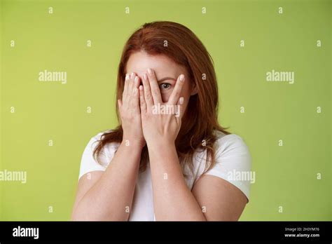 Not Peeking Playful Charismatic Middle Aged Ginger Redhead Woman Close