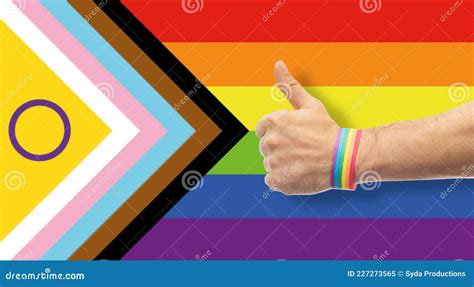 Hand With Gay Pride Rainbow Wristband Shows Thumb Stock Image Image Of Adult Freedom 227273565