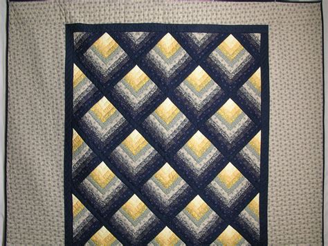 Different variations for a log cabin quilt. Navy and Yellow Chevron Log Cabin Quilt | Hannah's Quilts