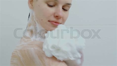 Woman Washing Naked Shoulders With Sponge At Shower Stock Video